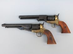 A pair of replica BKA six-shot percussion hammer-action revolvers with brass-effect frames,
