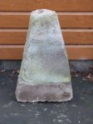 A natural stone staddle stone base,