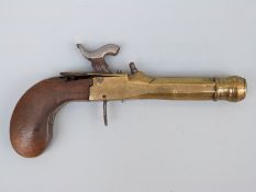 Belgian brass percussion hammer action pistol with shaped wooden grip and 3.