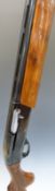 Remington 1100 12 bore semi-auto shotgun with named and engraved lock,