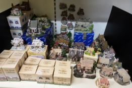 A collection of Lilliput Lane and David Winter style cottages to include Last of the Summer Wine,