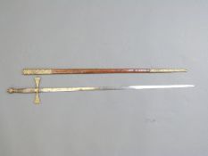 A Masonic ceremonial sword with wire handle and decorated pommel with engraving to handle,