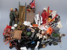 Four Action Man dolls together with a large quantity of clothing, accessories and Equipment Manuals.