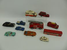 Twelve Dinky Toys diecast model vehicles including Spectrum Patrol Vehicle, police vehicles,