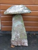 A natural stone staddle stone,