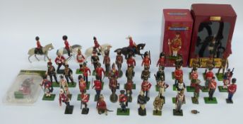 Fifty Britains and similar model soldiers including Cavalry, Parachute Regiment, Collectors Club,