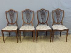 Four upholstered mahogany dining chairs
