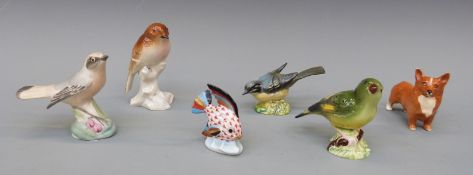A collection of six ceramic animals to include Herend fishnet fish,