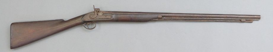 Enfield percussion hammer action rifle with steel butt plate and trigger guard, stock stamped 807,