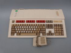 Acorn A3020 vintage computer and mouse