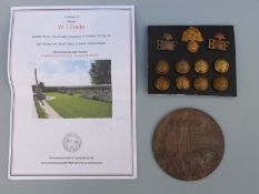 A WWI death plaque to W.J Dade The Royal Fusiliers with military insignia to the regiment.