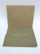 Two sets of Meccano outfit No 10 instructions in original folders.
