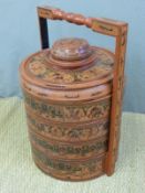A Burmese lacquered multi layered food carrier with elephant and figural decoration (77cm tall)