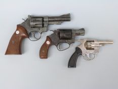 Three replica revolvers including an Italian Precise 880 and an MGC SW8