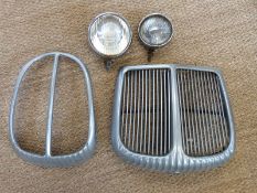 Two Daimler radiator grilles and two spotlights