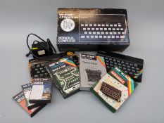 Two Sinclair ZX Spectrum vintage computers together with various games/programmes,