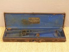 E J Churchill brown leather double barrelled side by side gun case with baize lined fitted interior