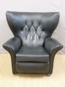 A button back Art Deco style armchair