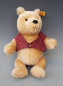 Steiff Teddy bear Winnie the Pooh with golden mohair, red waistcoat and jointed limbs,