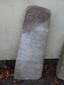 A carved natural stone marker or milepost with number 19 carved to top (approximate H85 x W29 x
