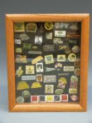 A collection of Land Rover related pin badges