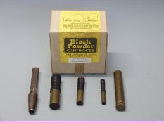 Three brass cartridge tapers with turned wooden handles together with a Lee Enfield brass oil