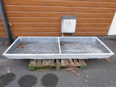 A galvanised water trough
