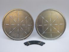 A pair of Meccano geared roller bearing plates and four gear segments