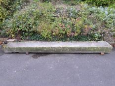 A particularly long carved natural stone trough (L366 x W48 x H23cm)