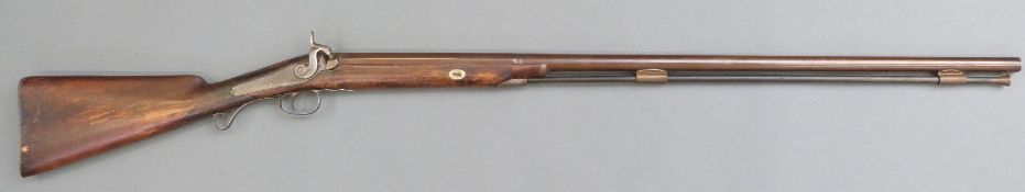 Durs Egg percussion hammer action gun with engraved lock named D Egg, scrolling trigger guard,