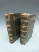 Two large leatherbound Family Devotional Bibles