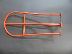 A tubular steel horse saddle stand