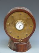 A circa WWI propeller clock made from the centre section of a laminated wood propeller,