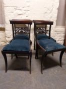 A set of four mahogany Regency style dining chairs