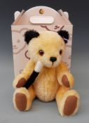 Steiff Teddy bear Sooty with yellow mohair, black ears, magic wand and jointed limbs, 30cm tall,