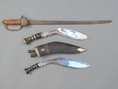 Two kukris, one engraved to blade Darjeeling 1944 J Forst Reme, horn handle, blade length 33cm,