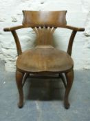 An oak elbow or captain's chair