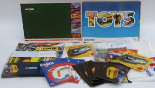 A collection of Corgi Toys ephemera including booklets, decals, badges, wallet, stickers etc.