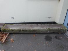 A rectangular carved natural stone trough (L284 x W47 x H22cm)