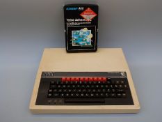 BBC Microcomputer system and Table Adventures game.