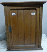 A small oak hanging cupboard with two shelves (H57 x W48 x D27cm)