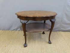 A 19thC quarter veneered oval walnut table with bergere undershelf (H65 x L85cm)