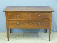 An inlaid mahogany dressing table with three drawers (H73 x W107 x D51cm)