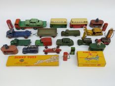 Twenty-six Dinky Toys and Supertoys diecast model vehicles and accessories including Foden Flatbed