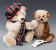 Two Steiff Teddy bears one with coffee and cream mohair, shaved snout and jointed limbs, 30cm tall,
