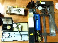 A quantity of marking out and measuring equipment including dial test indicators, square,