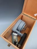A cased Griffin & George spectrometer with prism,