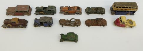 Eleven Dinky Toys, Tootsie Toy and Budgie Toys diecast model vehicles including tanks,