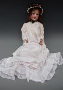 An Armand Marseille bisque headed girl doll with open mouth,