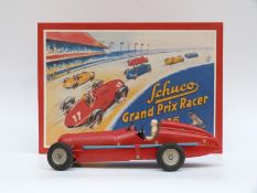 Schuco Grand Prix Racer clockwork tin plate car 1075 re-issue set with instructions, in box.